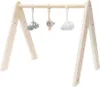 A wooden baby gym with three hanging toys. Produktbild-Vorschau
