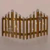 A decorative wooden fence with LED lights and snowflake ornaments. Náhľad obrázku produktu