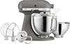 A KitchenAid Artisan stand mixer with accessories on a white background. Produktbild-Vorschau