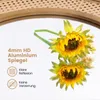 A close-up of a round mirror with a rattan frame, reflecting two artificial sunflowers. Text overlays describe the mirror's features. Podgląd zdjęcia produktu