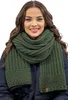 A woman wearing a green scarf and a dark blue jacket. Produktbild-Vorschau