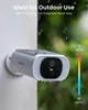 A white security camera with a solar panel on top is mounted on a white wall, with rain falling on it. A temperature scale is shown on the right side. Náhled obrázku produktu