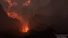A volcanic landscape with flowing lava and rocky terrain. Produktbild-Vorschau