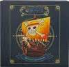 The image shows the front of a One Piece Advent Calendar box, featuring the Straw Hat Pirates' Jolly Roger on a ship's sail. Produktbild-Vorschau