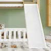 A child's bedroom with a bunk bed and slide. Produktbild-Vorschau