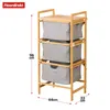 A bamboo laundry sorter with three gray fabric bins, shown against a white background with dimensions indicated. Anteprima dell’immagine prodotto