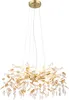 A gold-colored chandelier with crystal accents, suspended from a white ceiling mount. Anteprima dell’immagine prodotto