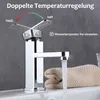 A close-up of a modern chrome faucet with water flowing, illustrating temperature control. Podgląd zdjęcia produktu