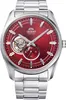 A close-up studio shot of an Orient automatic watch with a red dial and silver metal band. Podgląd zdjęcia produktu
