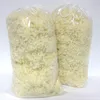 Two clear plastic bags filled with light-colored, fluffy material, likely wool balls, are shown against a white background. Produktbild-Vorschau