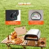 An outdoor setting with a pizza oven, pizza, bread, and a chair on a wooden table. Produktbild-Vorschau
