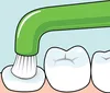 A close-up illustration of a green toothbrush cleaning a tooth. Produktbild-Vorschau