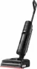 A black and gray wet and dry vacuum cleaner is shown against a white background. Voir les images du produit