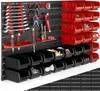A wall-mounted organizer with various tools and storage bins. Produktbild-Vorschau