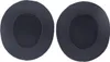 Two black ear pads for headphones are shown against a white background. Náhled obrázku produktu