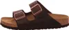 A side view of a brown Birkenstock sandal with bronze buckles. Produktbild-Vorschau