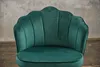 A close-up shot of a green velvet chair with a scalloped back. Produktbild-Vorschau