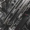A close-up view of computer RAM modules installed on a motherboard. Produktbild-Vorschau