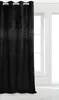 A black velvet curtain with sparkling details is shown hanging in front of a window. Podgląd zdjęcia produktu
