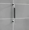 A grab bar mounted on a tiled wall. Náhled obrázku produktu