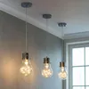 Three pendant lights with Edison-style bulbs containing fairy lights, hanging from a ceiling. Produktbild-Vorschau