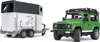 A toy Land Rover Defender and a toy horse trailer are shown side-by-side against a white background. Produktbild-Vorschau