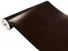 A roll of dark brown wood-grain contact paper. Produktbild-Vorschau