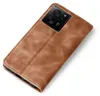 A brown leather flip case for a smartphone is shown on a white background. Produktbild-Vorschau