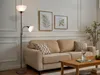 A living room scene with a sofa, coffee table, and a floor lamp. Náhled obrázku produktu