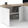 A close-up view of a white and wood-effect media console with open doors, revealing shelves with books and a storage box. Náhled obrázku produktu