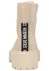 A back view of a beige boot with a black and white logo strip. Produktbild-Vorschau