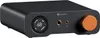 A black Fosi Audio ZH3 desktop HiFi DAC with an orange volume knob and a circular display. Produktbild-Vorschau