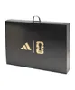 A black box with gold logos and text, likely packaging for a sports collectible. Produktbild-Vorschau