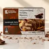 Kandylas Halva Schokolade 400 g Packung mit Krümeln auf hellem Tisch Produktbild-Vorschau