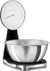 A black and silver Smeg kitchen scale with a stainless steel bowl. Voir les images du produit