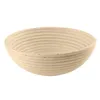 A close-up view of a round, woven basket. Anteprima dell’immagine prodotto