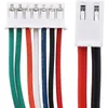 Close-up of two white connectors with wires of various colors. Náhled obrázku produktu