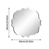 A decorative mirror with size indicators. Voir les images du produit
