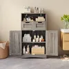 A bathroom cabinet with its doors open, displaying various toiletries and towels. Produktbild-Vorschau
