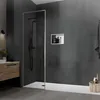 A modern bathroom with a walk-in shower, vanity, and a built-in shower niche. Náhled obrázku produktu