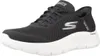A black Skechers Go Walk Flex shoe with a white sole is shown against a white background. Náhľad obrázku produktu