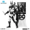 A black and white action figure of Batman, holding two knives, displayed with a card and stand. Anteprima dell’immagine prodotto