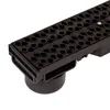 A close-up, angled view of a black drainage channel with a hexagonal grate pattern. Anteprima dell’immagine prodotto