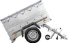 A silver utility trailer is shown against a white background, tilted on its side. Produktbild-Vorschau