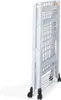 A white folding drying rack with wheels, shown from a side angle, folded and standing upright. Produktbild-Vorschau