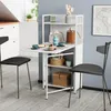 A compact dining set with a folding table and chairs in a kitchen or dining area. Produktbild-Vorschau