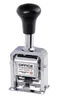 A silver and black automatic numbering machine with a black handle is shown against a white background. Anteprima dell’immagine prodotto