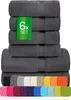 A stack of six dark gray towels with a green tag on the second towel from the top, and a row of various colored towels below. Produktbild-Vorschau