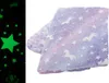 A folded blanket with a unicorn and star pattern. Náhľad obrázku produktu