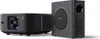 A black projector and a black subwoofer are displayed side-by-side on a white background. Anteprima dell’immagine prodotto